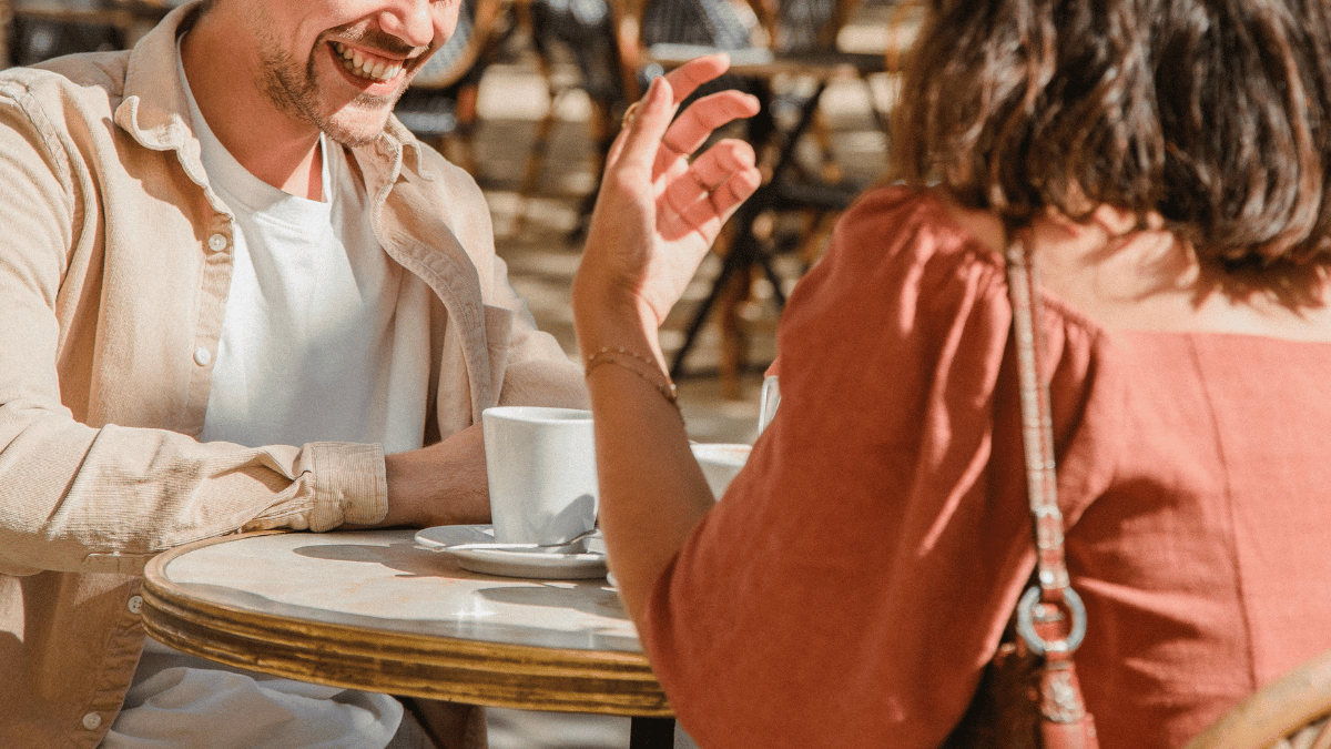 man and woman on coffee date